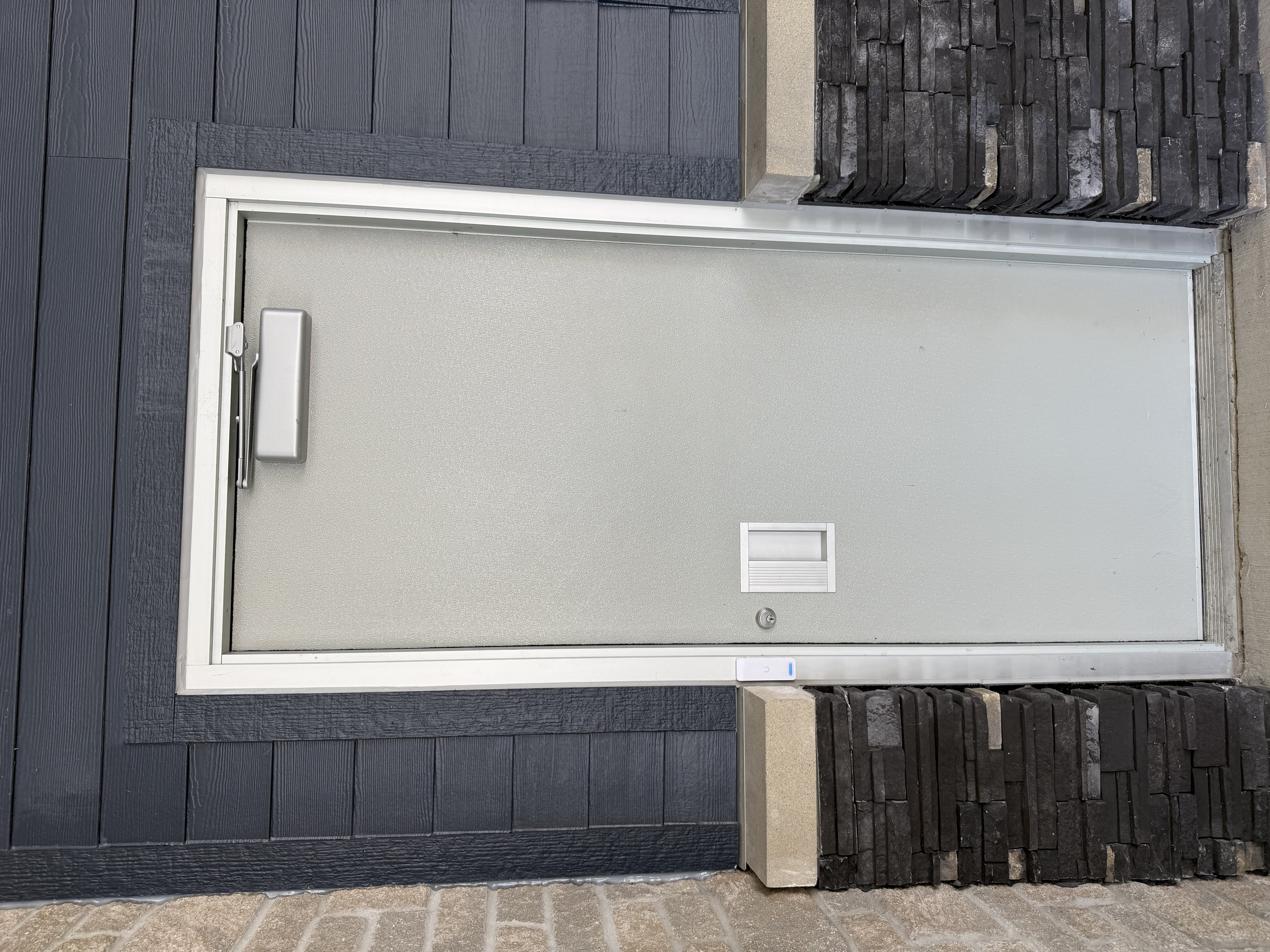 Exterior entrance with electronic access reader